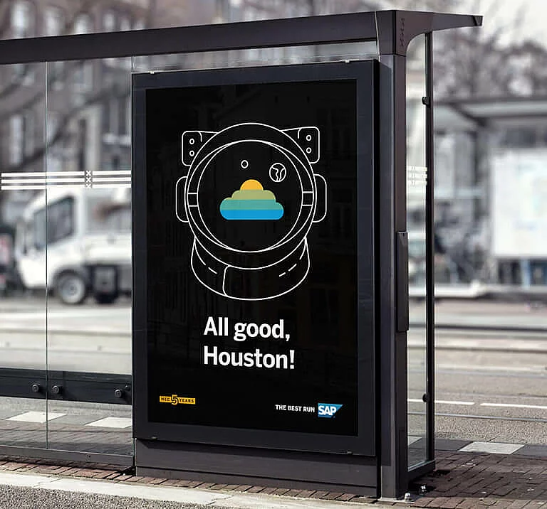 Campaigns The photo shows a billboard at a bus stop with a stylized astronaut and the text: All good, Houston